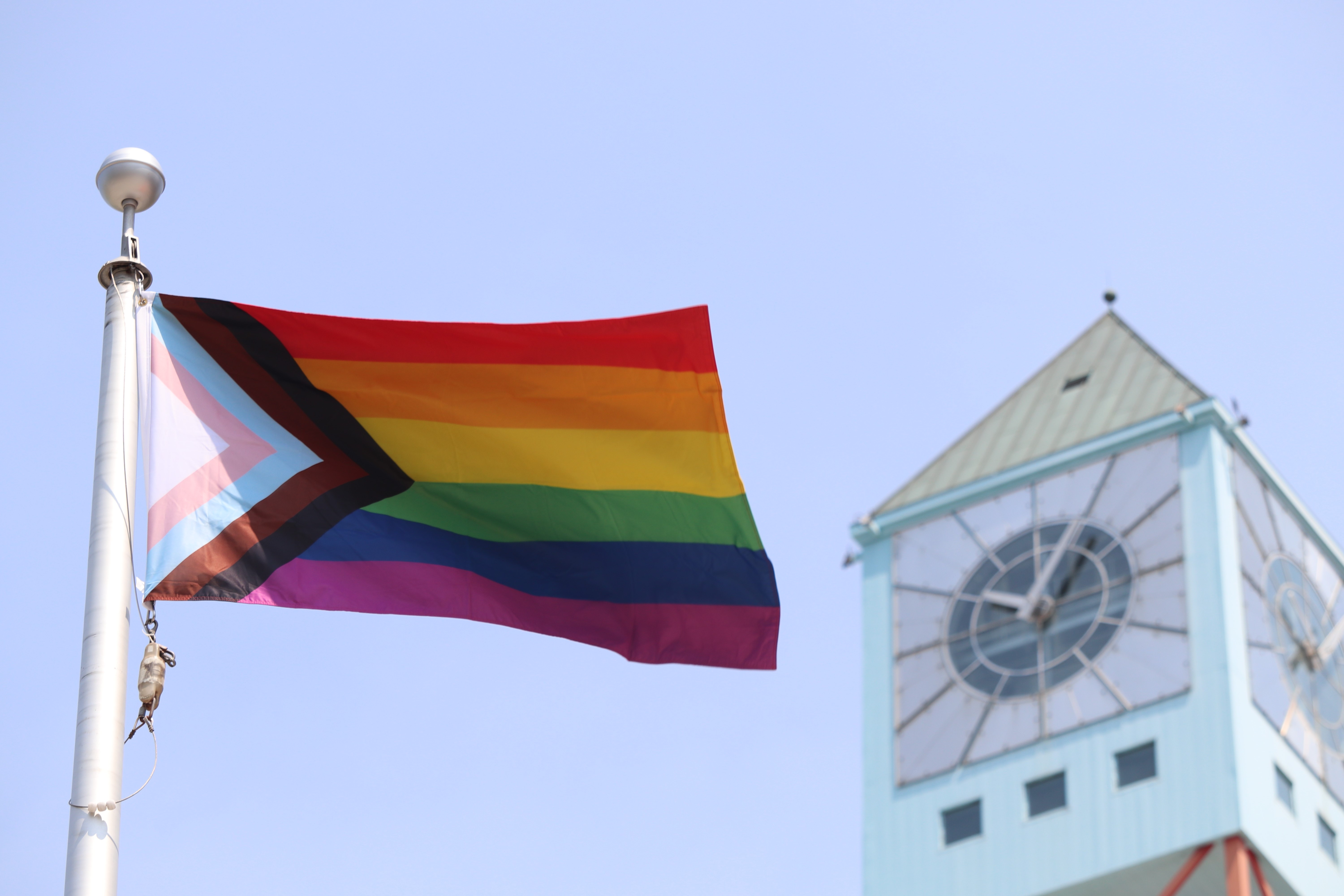 The Progressive flag flying in front of the Civic Centre clock tower.